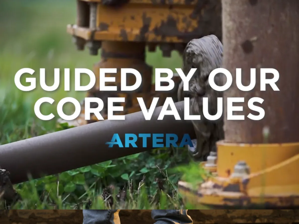 Artera website — homepage hero, an infrastructure field crew at work.